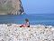 Lady sunbathing in Uzuri bay - north-east of Olkhon Island