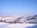 Tour to Baikal - Tour to Olkhon: Approaching Olkhon Island - Lake Baikal is infront.